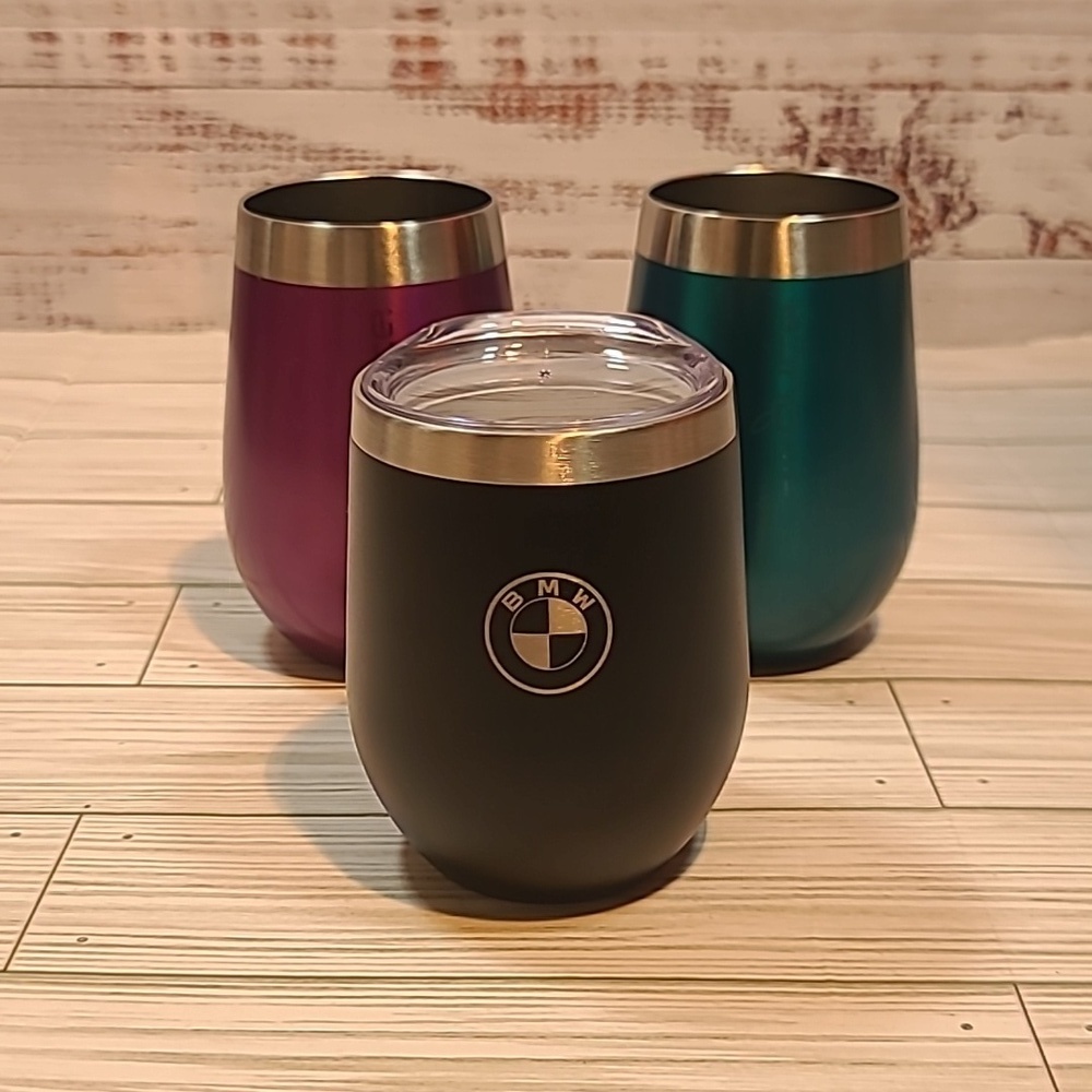 Set of three stainless steal drinking glasses